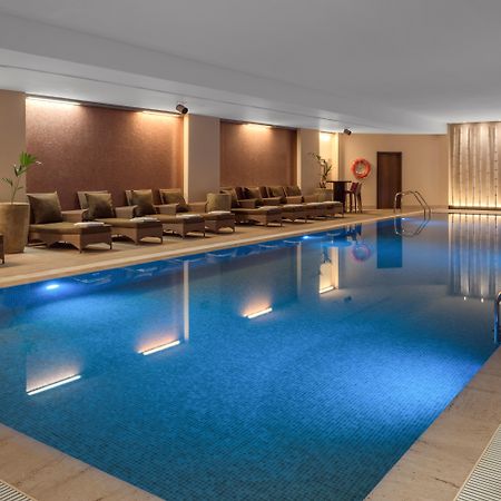 ดับเบิลทรี บาย ฮิลตัน ลา ตอเร กอล์ฟ แอนด์ สปา รีสอร์ต Hotel Roldan ภายนอก รูปภาพ The swimming pool at the hotel