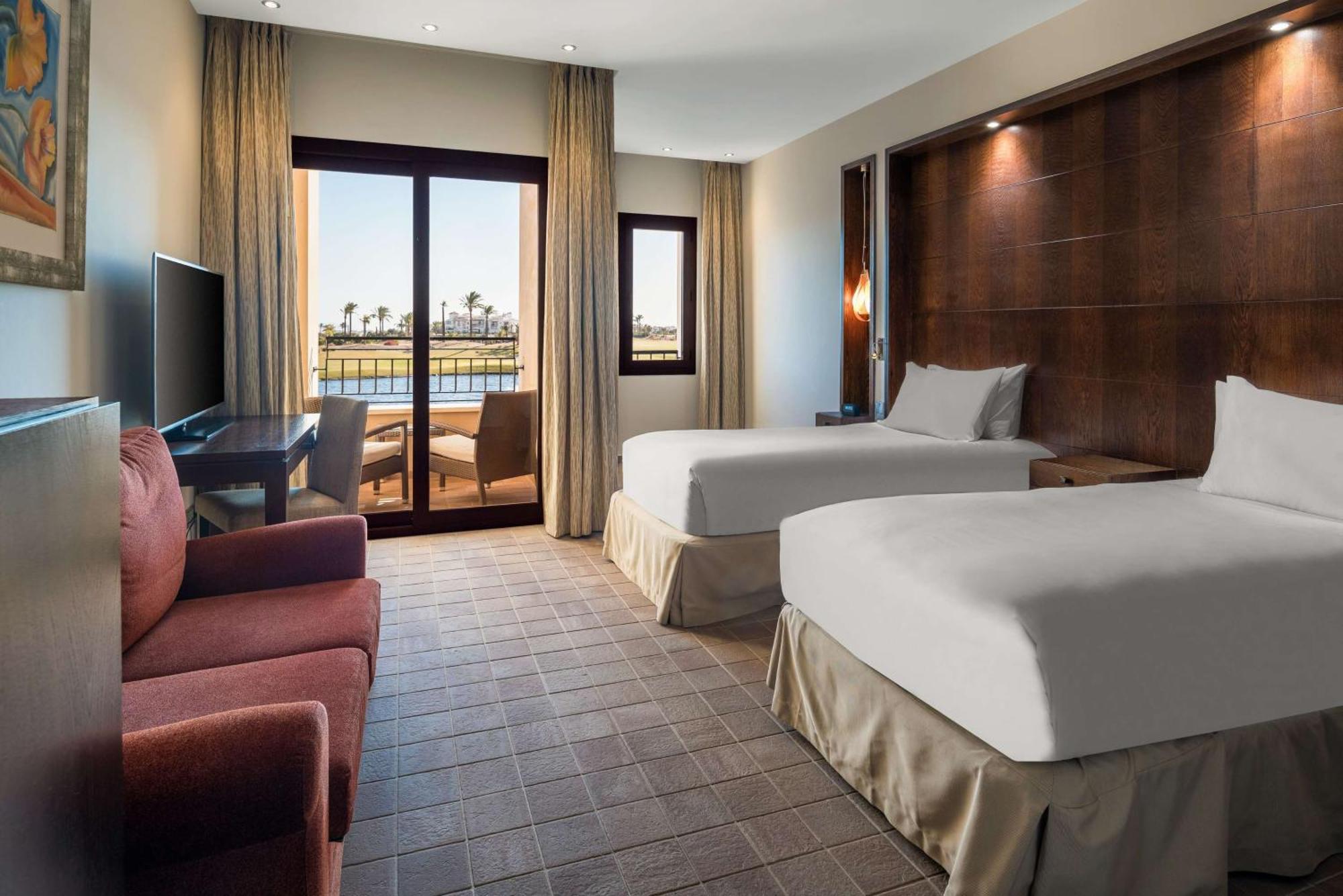ดับเบิลทรี บาย ฮิลตัน ลา ตอเร กอล์ฟ แอนด์ สปา รีสอร์ต Hotel Roldan ภายนอก รูปภาพ