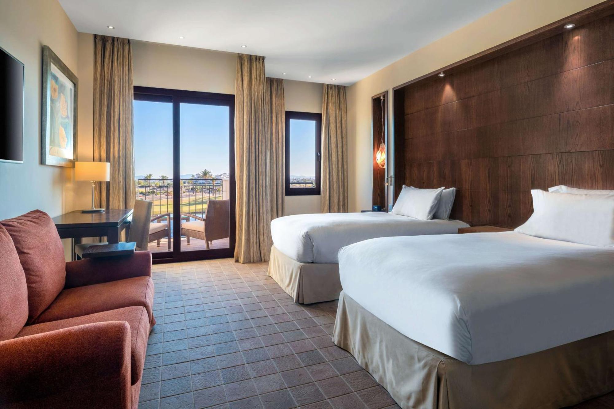 ดับเบิลทรี บาย ฮิลตัน ลา ตอเร กอล์ฟ แอนด์ สปา รีสอร์ต Hotel Roldan ภายนอก รูปภาพ